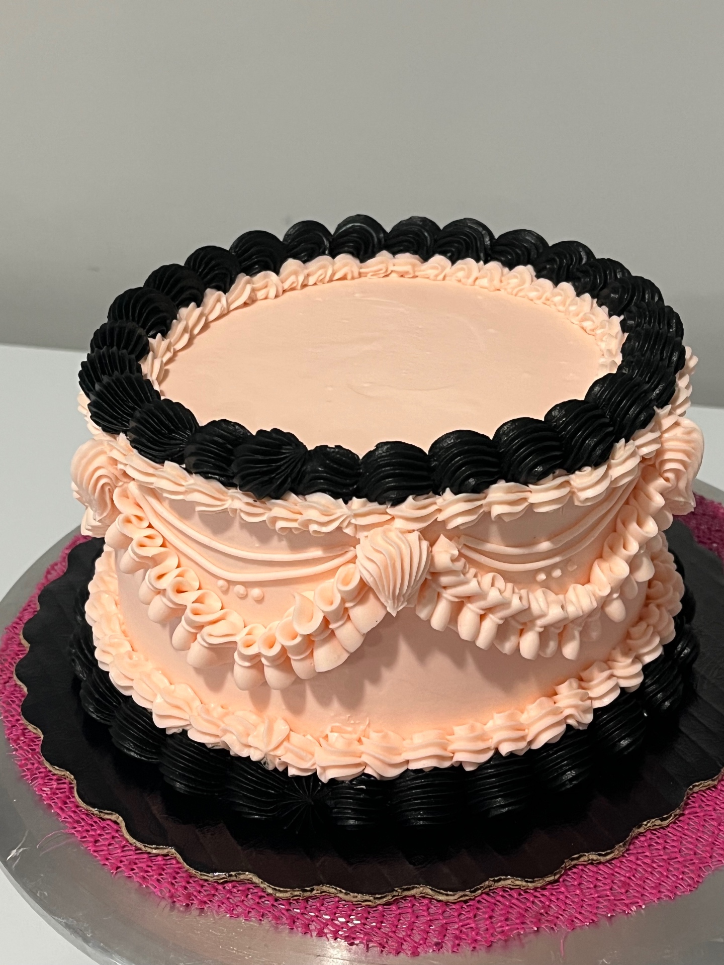 Custom cake with delicate hand-piped detail