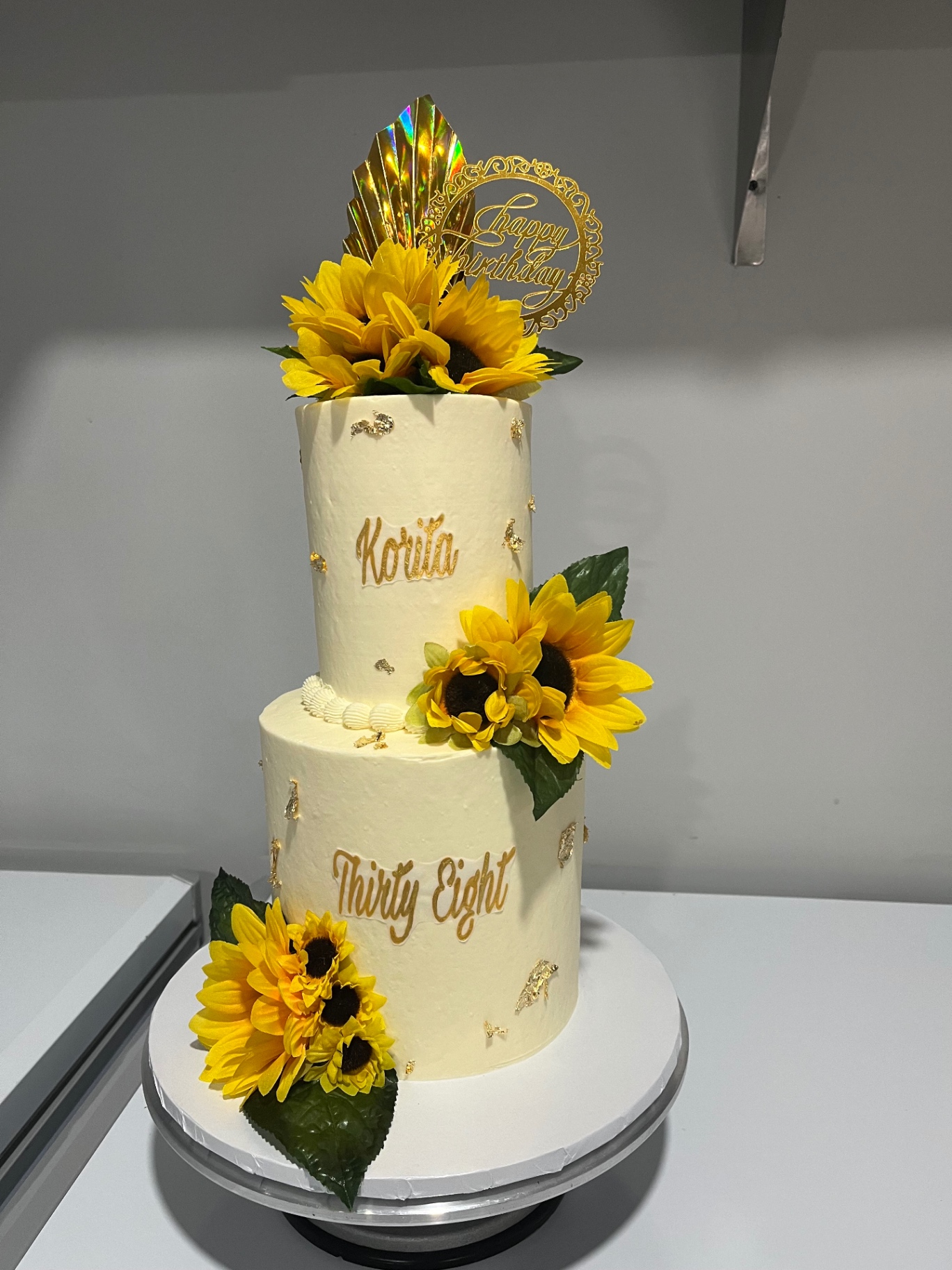 Two-tier sunflower celebration cake