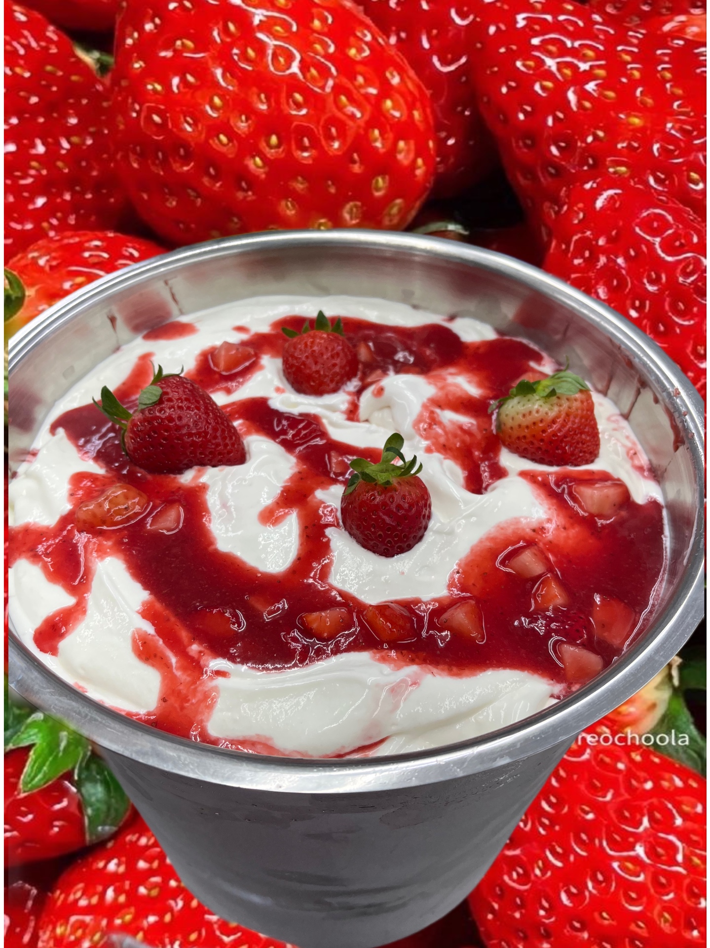 Ice cream with strawberry syrup and fresh strawberries